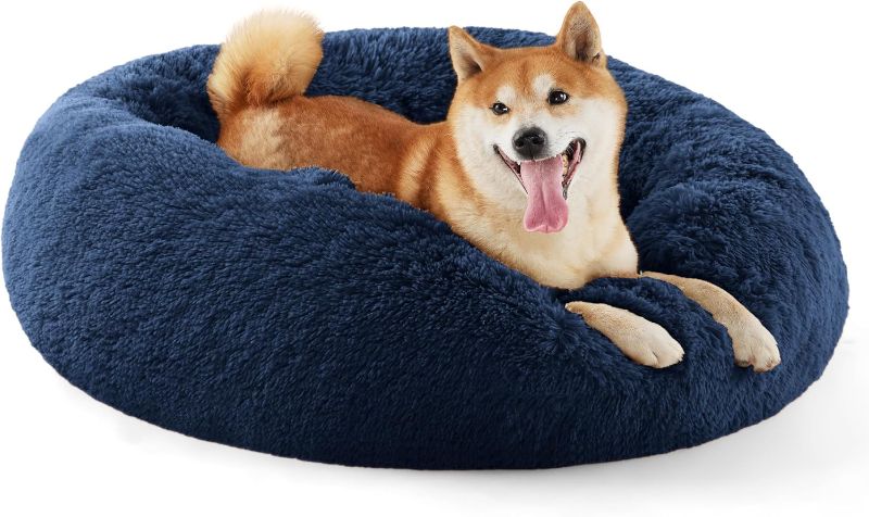 Photo 1 of Bedsure Calming Dog Bed for Medium Dogs - Donut Washable Medium Pet Bed, 30 inches Anti-Slip Round Fluffy Plush Faux Fur Cat Bed, Fits up to 45 lbs Pets, Navy
