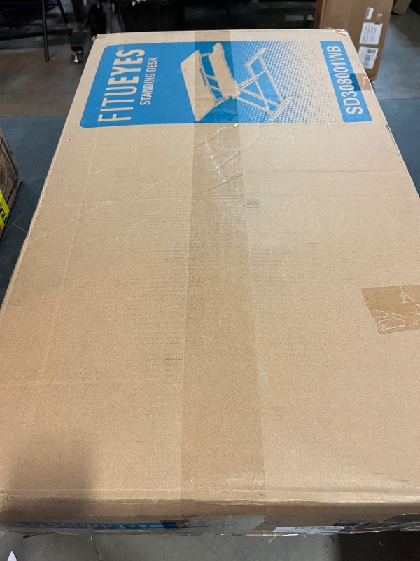 Photo 1 of FITUEYES Height Adjustable Standing Desk 32” Wide Sit to Stand Converter Stand Up Desk Tabletop Workstation for Dual Monitor Riser FSD308001WB
