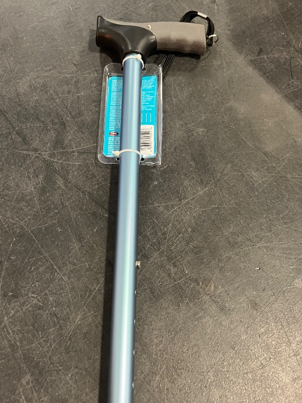 Photo 1 of Carex Soft Grip Walking Cane with Strap, Anti-Slip Walking Cane for Easy Maneuvering, Walk Stick for Seniors & Adults with Added Support and Adjustable for Balance, Supports up to 250 lbs, Blue
