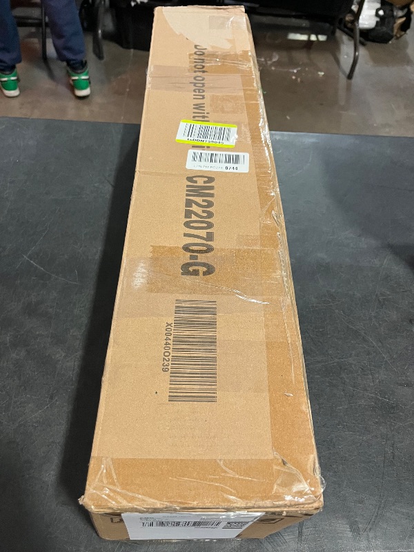 Photo 1 of National Tree Company 4.5 ft Pre-Lit Kingswood Fir Slim Artificial Christmas Tree, 150 Multicolor Lights, 330 Tips, Includes Stand, Green
