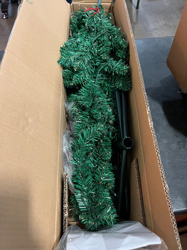 Photo 1 of National Tree Company 4.5 ft Pre-Lit Kingswood Fir Slim Artificial Christmas Tree, 150 Multicolor Lights, 330 Tips, Includes Stand, Green
