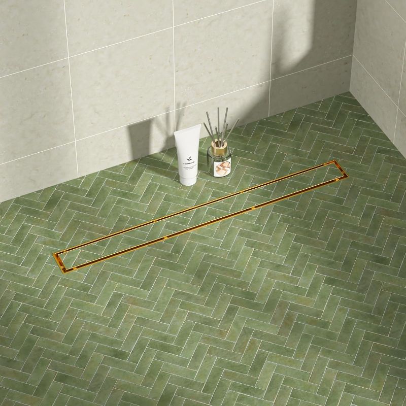 Photo 1 of Linear Shower Drain 30", Brushed Gold Floor Drain with Tiled Insert Grate & Hair Strainer, 304 Stainless Steel Bathroom 2-in-1 Tiled in Drain, CUPC Certified (Brushed Gold, 30'')