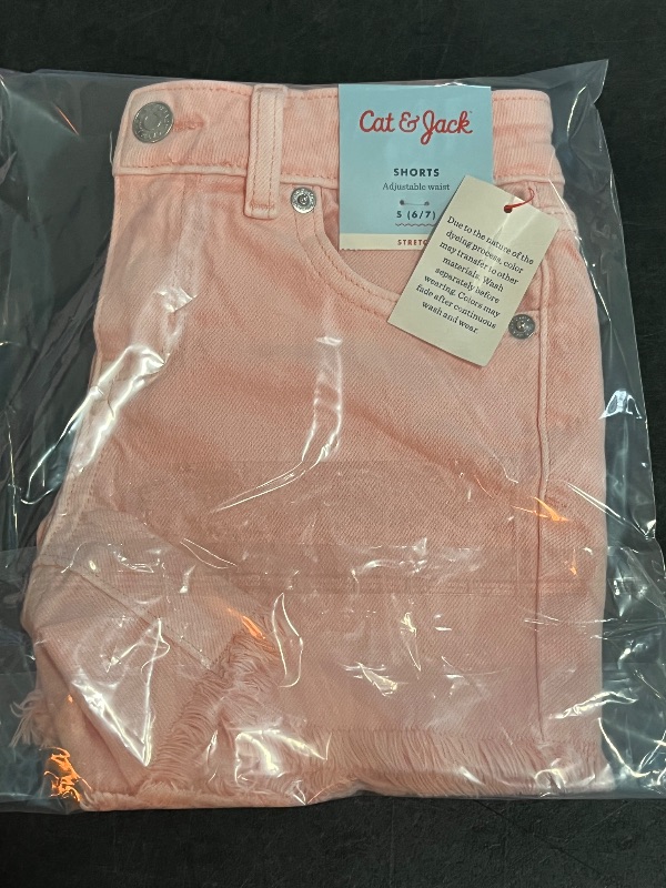 Photo 1 of (S) Girls' Mid-Rise Cutoff Jean Shorts - Cat & Jack™ Light Pink S: Adjustable Waistband, Frayed Hem, Stretch Denim
