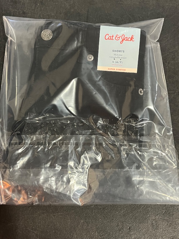 Photo 1 of (S) Girls' Cutoff Mid-Rise Jean Shorts - Cat & Jack™ Black S: Adjustable Waistband, Stretch Denim
