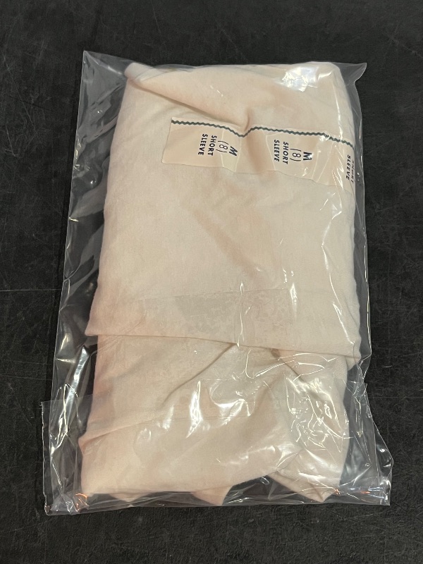 Photo 1 of (M) Girls' Short Sleeve Shell Heart Graphic T-Shirt - Cat & Jack™ Cream M: Cotton Blend, Relaxed Fit, Below Hip Length
