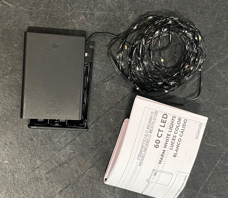 Photo 1 of Holiday Living 60 -Count 19.6-ft White LED Battery-operated Indoor Christmas String Lights Timer
