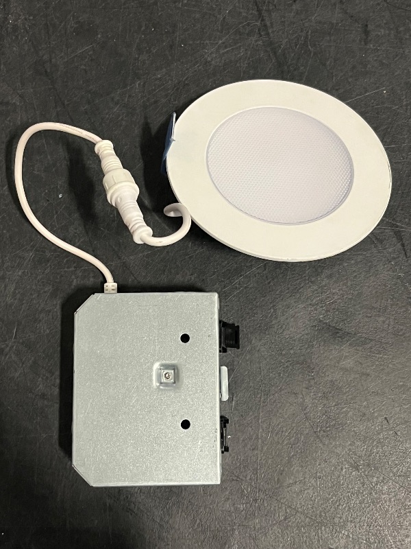 Photo 1 of HALO White 4-in 750 -Lumens Switchable white Round Dimmable LED Canless Wet rated Recessed Downlight
