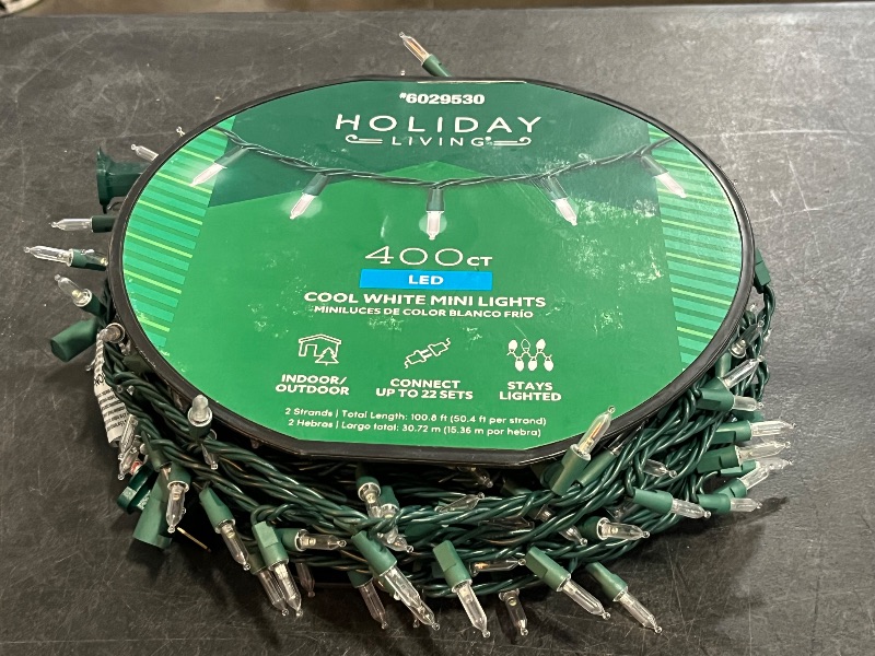 Photo 1 of Gerson 66762 - 60 Light 16.5' Green Wire Warm White LED Wide Angle Miniature Christmas Light String Set