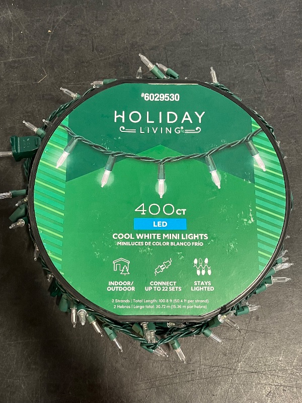 Photo 1 of Gerson 66762 - 60 Light 16.5' Green Wire Warm White LED Wide Angle Miniature Christmas Light String Set
