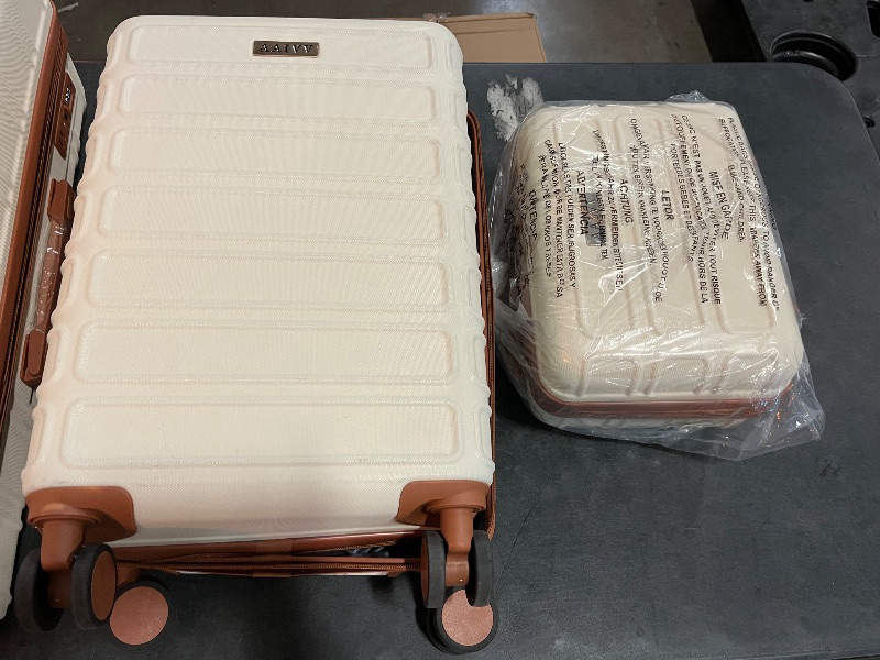 Photo 1 of AAIVV 4 Piece Luggage Set Expandable ABS Travel Suitcase Set TSA Lock Hardshell Durable Lightweight Traveling Luggage Sets Gift for Back to School (OFF White, 28in26in20in13in)
