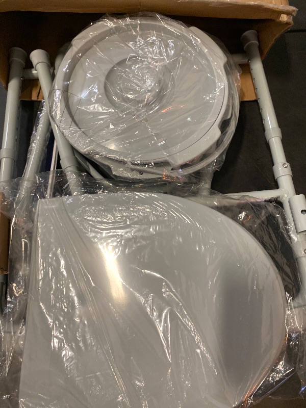 Photo 1 of Drive Medical 11148-1 Folding Steel Bedside Commode Chair, Portable Toilet, Supports Individuals Weighing Up To 350 Lbs, with 7.5 Qt. Bucket and 13.5 Inch Seat, Grey