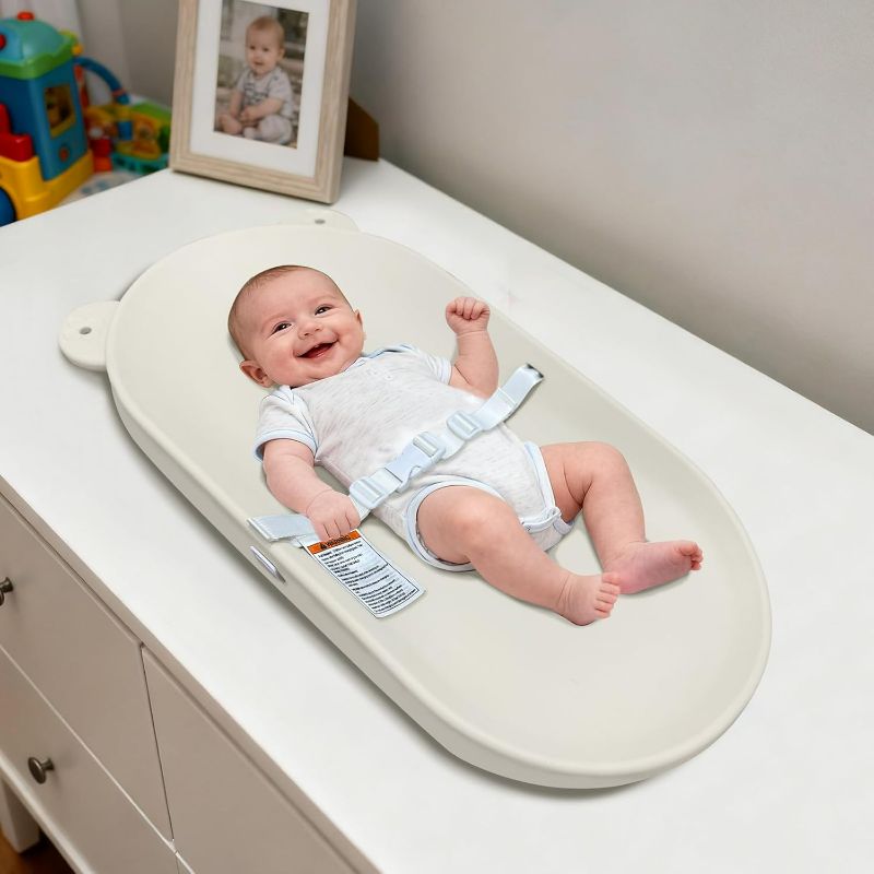 Photo 1 of Baby Changing Pad, EVA Waterproof Non-Slip Changing Table Pad with Adjustable Strap for Dresser Changing Table Nursery, Portable Diaper Changing Pad, Oat