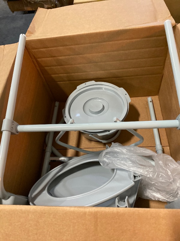 Photo 1 of Drive Medical 11148-1 Folding Steel Bedside Commode Chair, Portable Toilet, Supports Individuals Weighing Up To 350 Lbs, with 7.5 Qt. Bucket and 13.5 Inch Seat, Grey