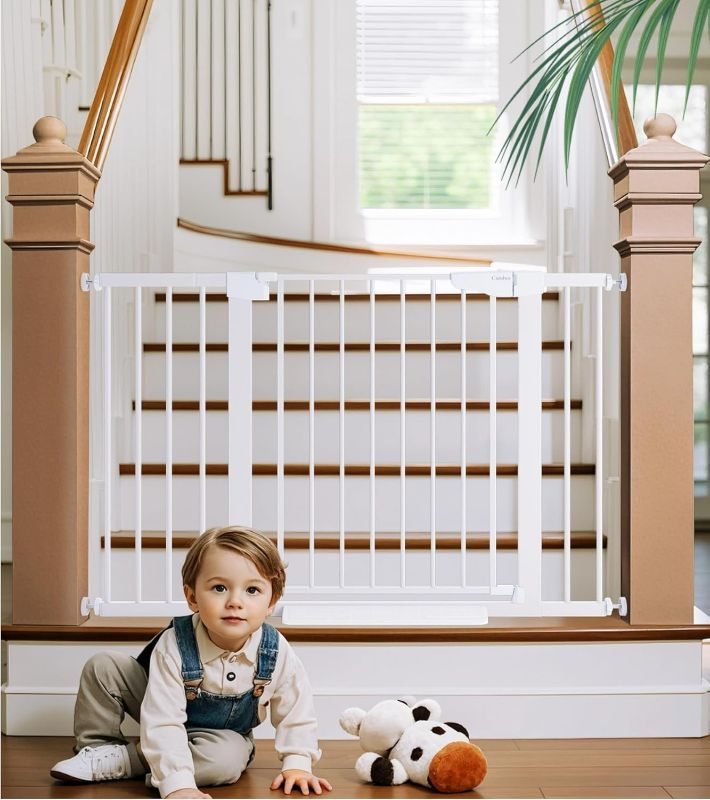 Photo 1 of Cumbor 29.7-48" Baby Gate for Stairs, Mom's Choice Awards Winner-Dog Gates for Doorways, Auto Close Safety Pet Gate for Dogs Indoor, Easy Install Pressure Mounted Child Gate with Walk Thru Door, White