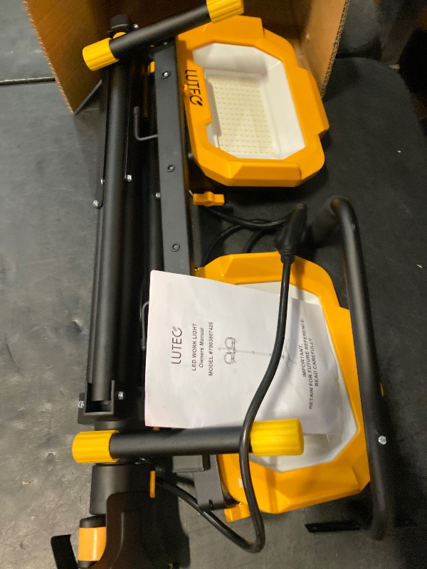 Photo 1 of LUTEC 25000 Lumen LED Work Lights with Stand, Dual Head Dimmable Work Light with 6 Brightness Levels, IP65 Waterproof Rotating WorkLights with Telescoping Tripod and 8.2 Ft 3-Prong Power Cord