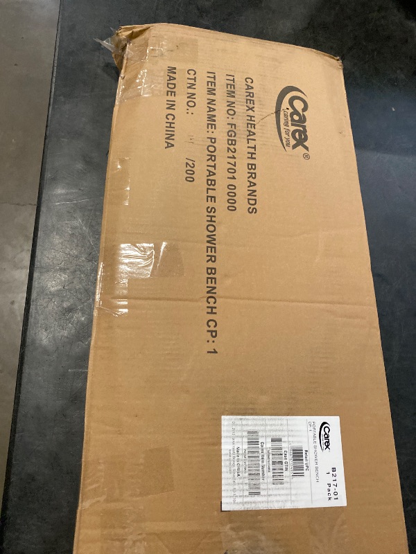 Photo 1 of Carex Portable Shower Bench - Shower Bath Seat - Fits tub having width in the range of 19"-28". Comfortable Contoured Seating Area with 300 Pound Weight Capacity, Portable and Easy to Store