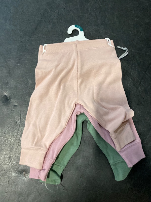 Photo 1 of Size 0-3M Baby 3pk Solid Cotton Pants - Cloud Island™ Pink/Green 0-3M: Relaxed Leg, Full Waistband Elastic, Machine Washable