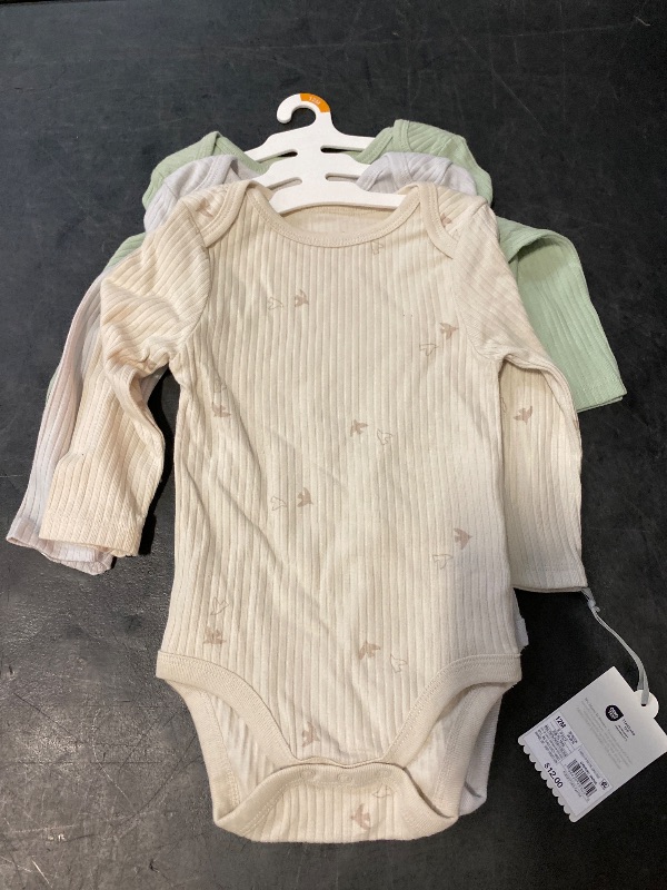 Photo 1 of Size 12M Baby 3pk Solid Long Sleeve Wide Ribbed Bodysuit - Cloud Island™ 12M: Cotton, Midweight, Crotch Snap, Lap Shoulder