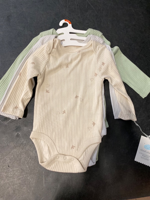 Photo 1 of 6-9M - Baby 3pk Solid Long Sleeve Wide Ribbed Bodysuit - Cloud Island™ 6-9M: Cotton, Midweight, Crotch Snap, Lap Shoulder