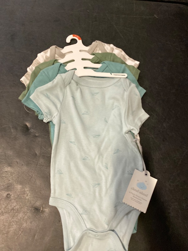 Photo 1 of 6-9M - Baby 4pk Airplanes Short Sleeve Cotton Bodysuit - Cloud Island™ Blue 6-9M: Lap Shoulder, Crotch Snap, Check Pattern