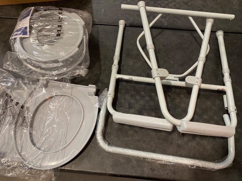 Photo 1 of Drive Medical 11148-1 Folding Steel Bedside Commode Chair, Portable Toilet, Supports Individuals Weighing Up To 350 Lbs, with 7.5 Qt. Bucket and 13.5 Inch Seat, Grey