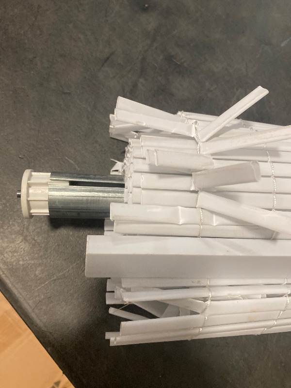 Photo 1 of 60 in. W x 72 in. L White Cordless Light Filtering Vinyl Roll-Up Blind with 1/4 in. Oval Slats 