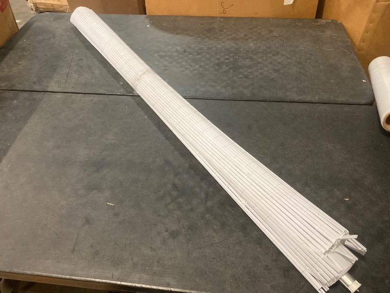 Photo 1 of 60 in. W x 72 in. L White Cordless Light Filtering Vinyl Roll-Up Blind with 1/4 in. Oval Slats 