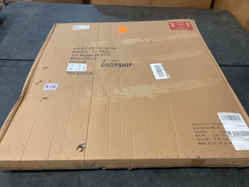 Photo 1 of Metal Sun and Moon Indoor Outdoor Abstract Patterned Wall Decor with Teal and Orange Accents, 36" x 2" x 36", Multi Colored