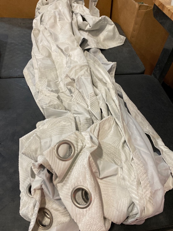 Photo 1 of Eclipse Branson Magnitech 100% Blackout Curtain, Grommet Window Curtain Panel, Seamless Magnetic Closure for Bedroom, Living Room or Nursery, 84 in long x 50 in wide, (2 Panel), Ivory