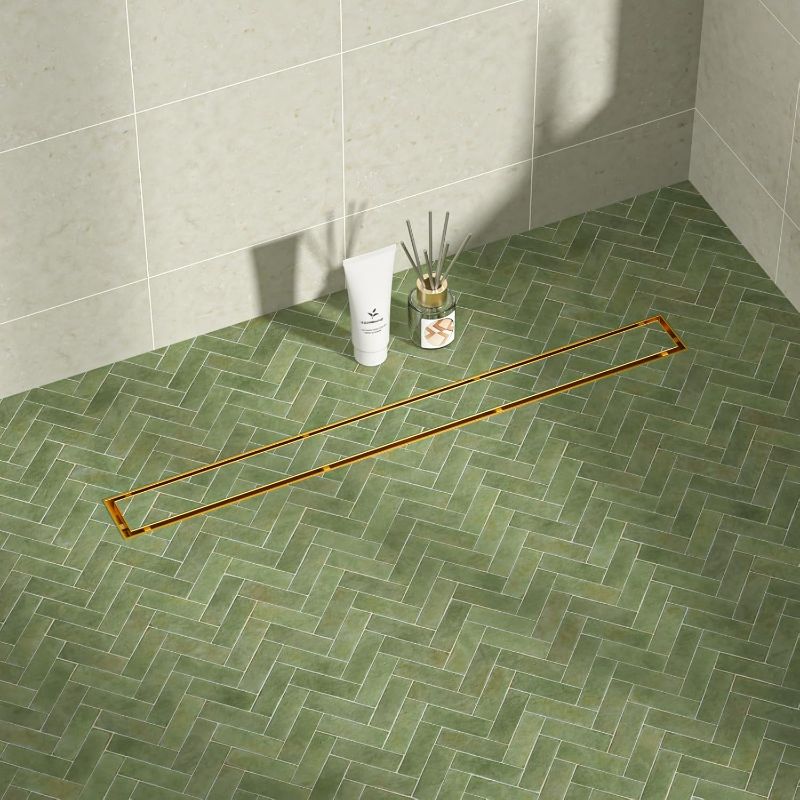 Photo 1 of Linear Shower Drain 30", Brushed Gold Floor Drain with Tiled Insert Grate & Hair Strainer, 304 Stainless Steel Bathroom 2-in-1 Tiled in Drain, CUPC Certified (Brushed Gold, 30'')