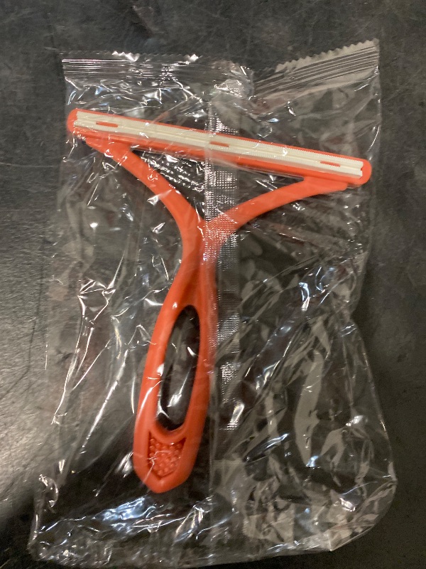 Photo 1 of Manual Lint & Pet Hair Remover, Portable Fabric Fuzz Cleaner and Fur Removal Brush for Clothes, Carpets, Furniture, and Car Seats – Reusable Hair Removal Tool for Home and Pets (Orange)