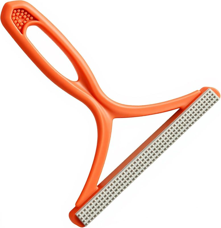 Photo 1 of Manual Lint & Pet Hair Remover, Portable Fabric Fuzz Cleaner and Fur Removal Brush for Clothes, Carpets, Furniture, and Car Seats – Reusable Hair Removal Tool for Home and Pets (Orange)