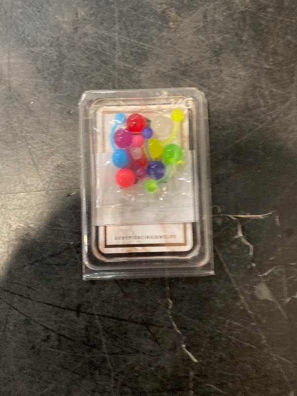 Photo 1 of CM Crareesi Mania 10Pieces Belly Button Rings Glow in The Dark Belly Rings 14G Banana Barbells Colorful Navel Piercing Jewellery Navel Bars