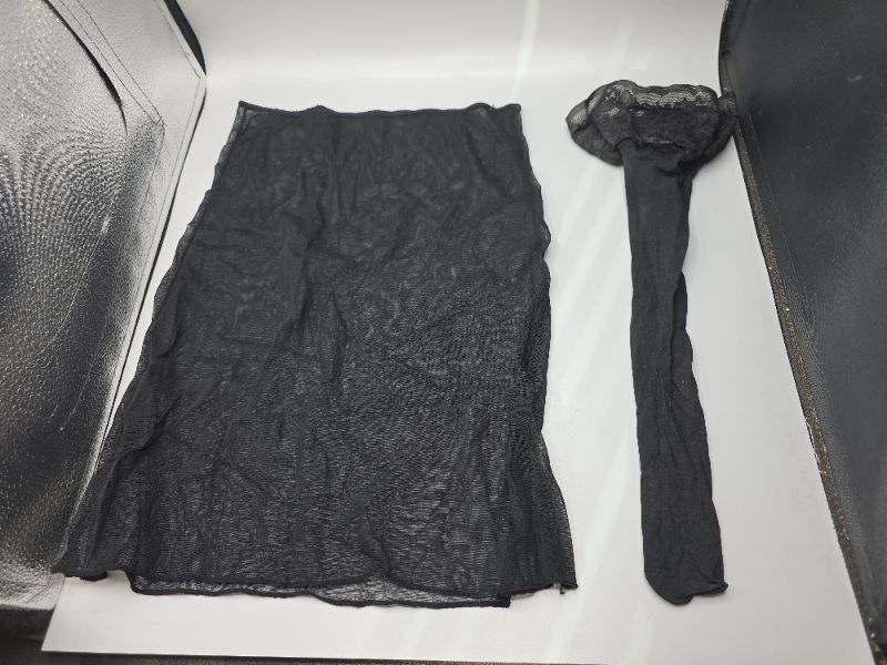 Photo 1 of Black Mesh Skirt & a Black Lace-Trimmed Stocking