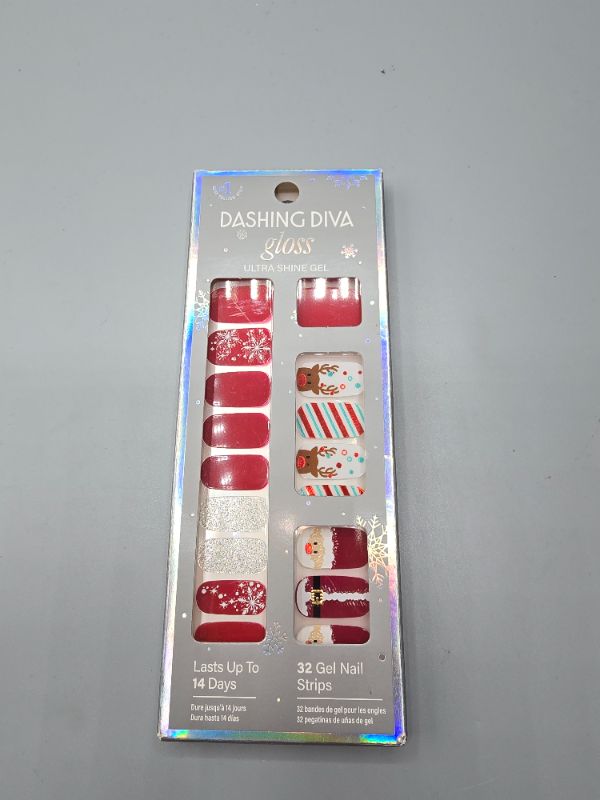 View 2 of Dashing Diva Gloss Nail Strips - Santa's Helper | UV Free, Chip Resistant, Long Lasting Stickers | Contains 32 Nail Wraps, 1 Prep Pad, 1 File