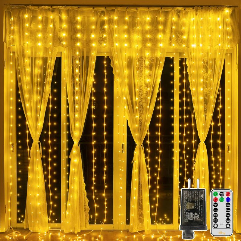 Photo 1 of Ollny Curtain Lights 300LED 9.8ftx9.8ft, Connectable IP67 Waterproof Outdoor Curtain String Lights with Remote, Plug-in Untangle Fairy Lights with 8 Modes 3 Timers for Wall Backdrop Decor(Warm White)