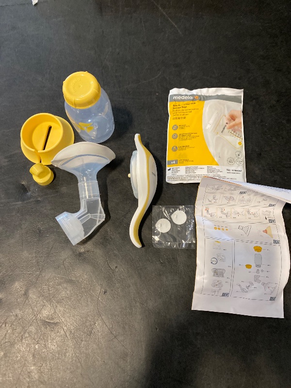 Photo 1 of Medela Harmony Manual Breast Pump, Compact Swiss Design with PersonalFit Flex Shields and Medela's 2-Phase Expression Technology
