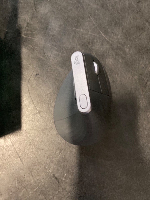 Photo 1 of Logitech MX Vertical Wireless Mouse – Ergonomic Design Reduces Muscle Strain, Move Content Between 3 Windows and Apple Computers, Rechargeable, Graphite