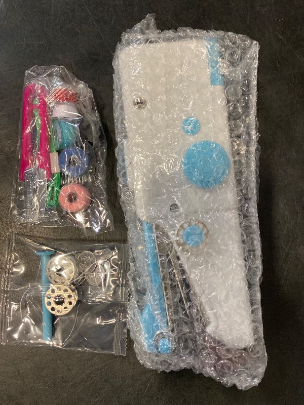 Photo 1 of Mini Sewing Machine