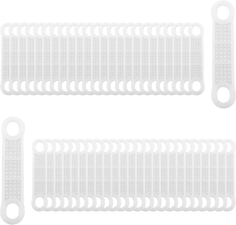 Photo 1 of Clothing Hanger Grips DGZZI 50PCS 10.5x2cm Clear Non-Slip Rubber Clothes Hanger Strips with Two Holesfor Wood and Plastic Hangers