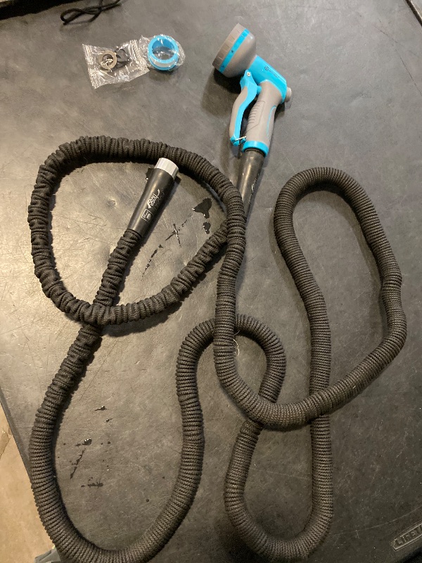 Photo 1 of Pocket Hose Silver Bullet 2.0 Expandable Garden Hose 50-FT with Turbo Shot Nozzle, AS-SEEN-ON-TV, Lead-Free, Solid Aluminum Connectors, Easy On/Off Valve, Kink-Free, Leak-Proof