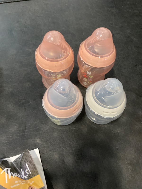 Photo 1 of Tommee Tippee Natural Start 8 Piece BPA Free Bottle Set, Includes 2 x 5 oz & 2 x 9 oz Bottles, 1 x Medium Flow Nipple, 1 x 0-6m Pacifier, 1 x Removable Bottle Handle, 1 x Cleaning Brush, Pink