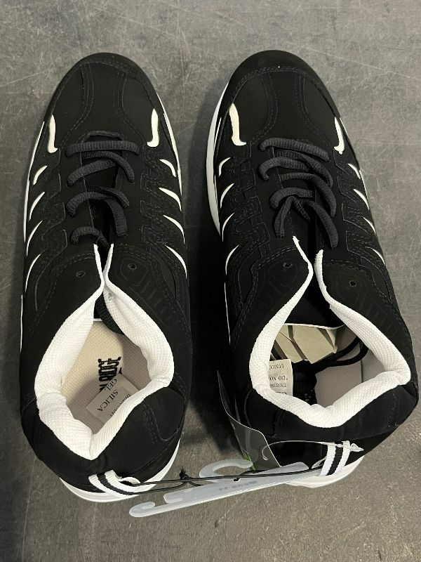 Photo 1 of Size 11 Men's Lace Up Sneakers, Black and White