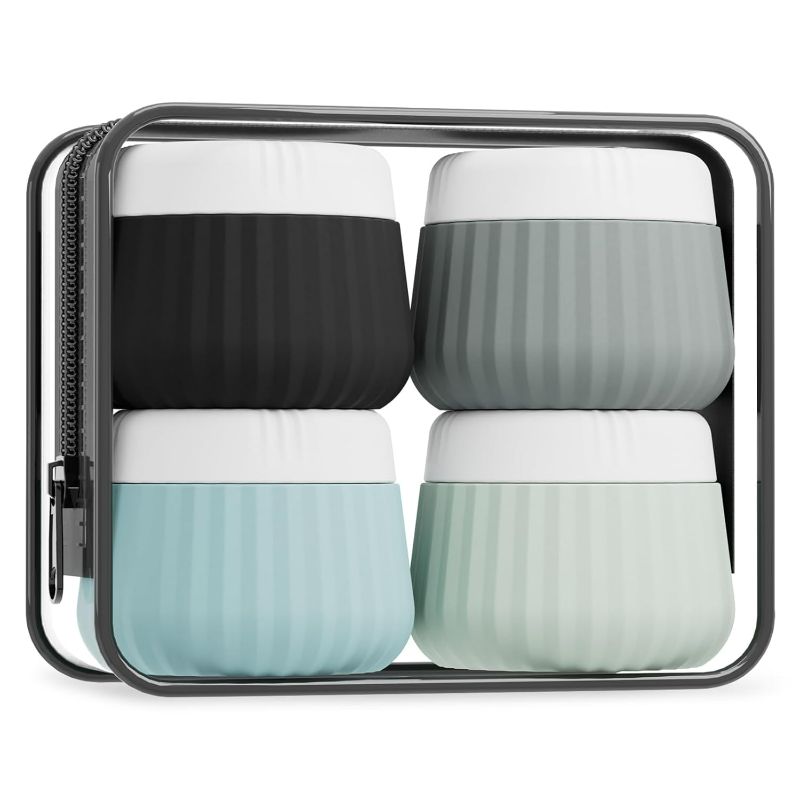 Photo 1 of Travel Containers for Toiletries 4 Pack, TSA Approved Travel Size Toiletries, Travel Size Containers, With Clear Bag Leak Proof Silicone Jars, Travel Essentials Creams Jars Carrying Small Items