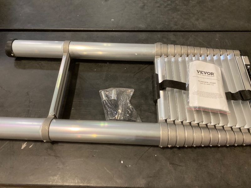 Photo 1 of 20.3FT VEVOR Telescoping Ladder, Aluminum Lightweight Extension Ladder, Multi-button Retraction Collapsible Ladder, 419 LBS Capacity with Non-slip Feet, Portable Compact Ladders for Home, RV, Loft