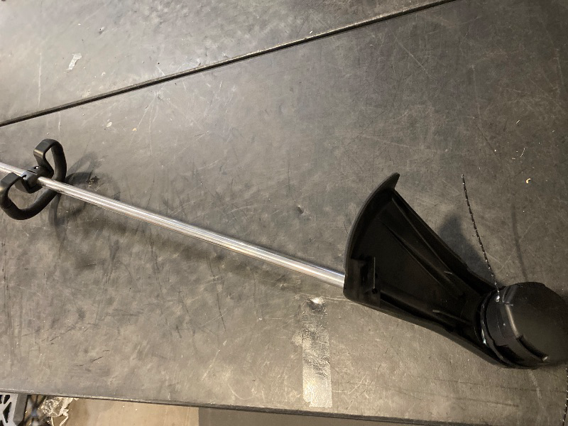 Photo 1 of 25.4 cc Gas 2-Stroke X Series Pro Straight Shaft String Trimmer with High Torque Gear Ratio and Speed-Feed Bump Head