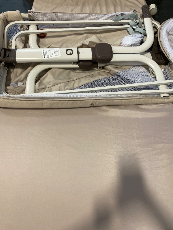 Photo 1 of Baby Bassinet Bedside Sleeper, Upgraded Stability Bedside Crib with Full Mesh Sides, Soft Sheet, 6-Height Adjustment, Storage Basket, Easy Folding Portable Bassinet for Newborns,Camel