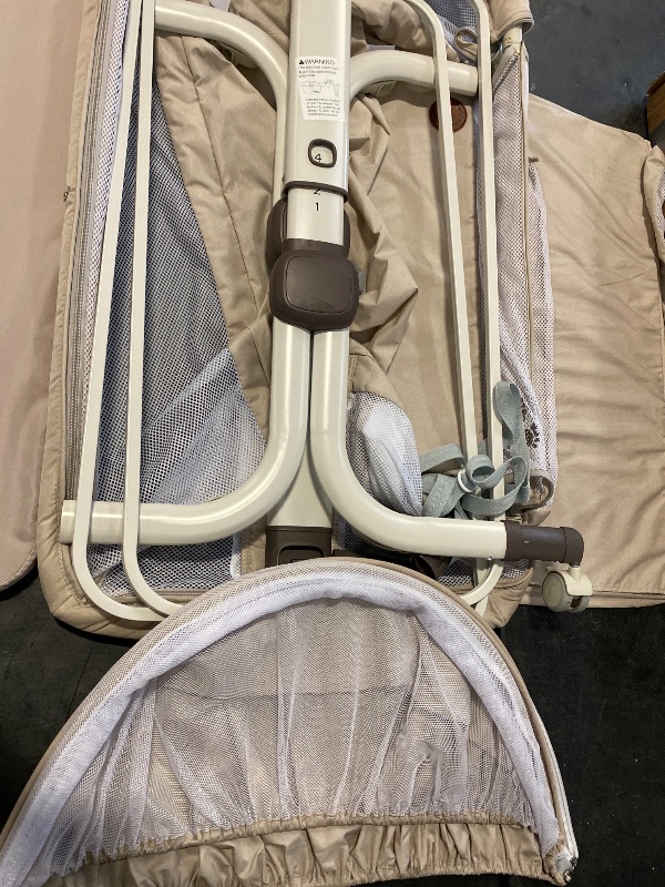 Photo 1 of Baby Bassinet Bedside Sleeper, Upgraded Stability Bedside Crib with Full Mesh Sides, Soft Sheet, 6-Height Adjustment, Storage Basket, Easy Folding Portable Bassinet for Newborns,Camel