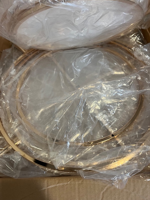 Photo 1 of Gold Arch Backdrop Stand 5Ft Wedding Round Hoop Backdrop Stand, 4 Tier Floral Balloon Arch Stand for Wedding Centerpiece Baby Shower Birthday Ceremony Background Decoration