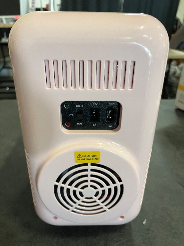 Photo 1 of Missing Charger**
YASHE Mini Fridge, 6 Liter/8 Can 110V AC/DC Portable Thermoelectric Cooler Refrigerators for Bedroom, Skincare, Beverage, Office, Dorm Room and Car, Pink
